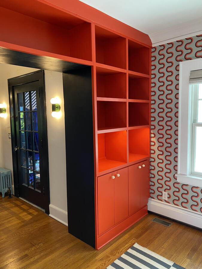 Custom Built-In Cabinets and Bookshelves w/ Lighting. Integrated into room doorway