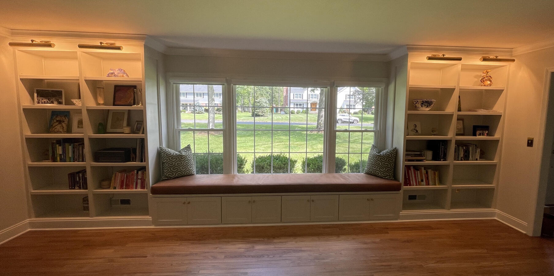 Custom Built-In Bookshelves w/ Window Bench and Lighting
