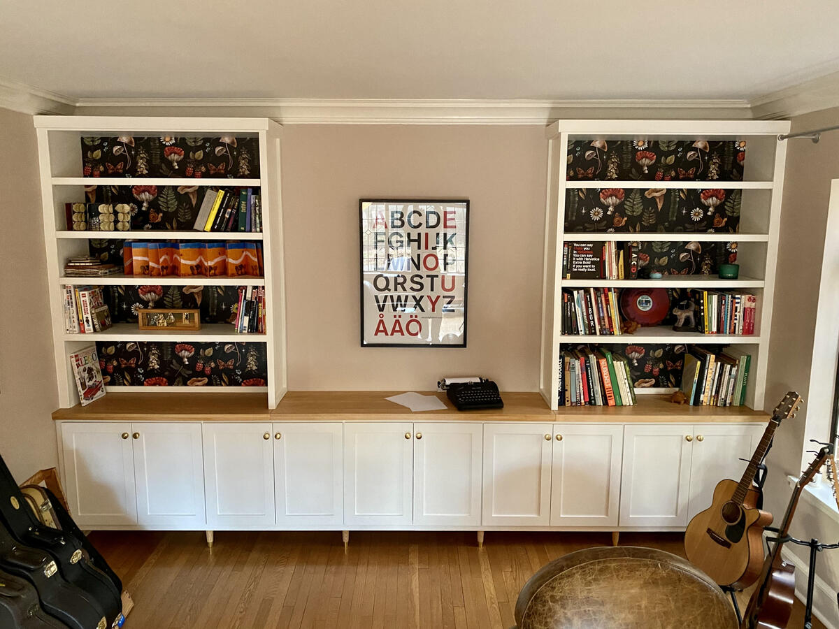 Custom Built-Ins w/ Maple Counter Top, Wallpaper, and Legs w/ Brass details
