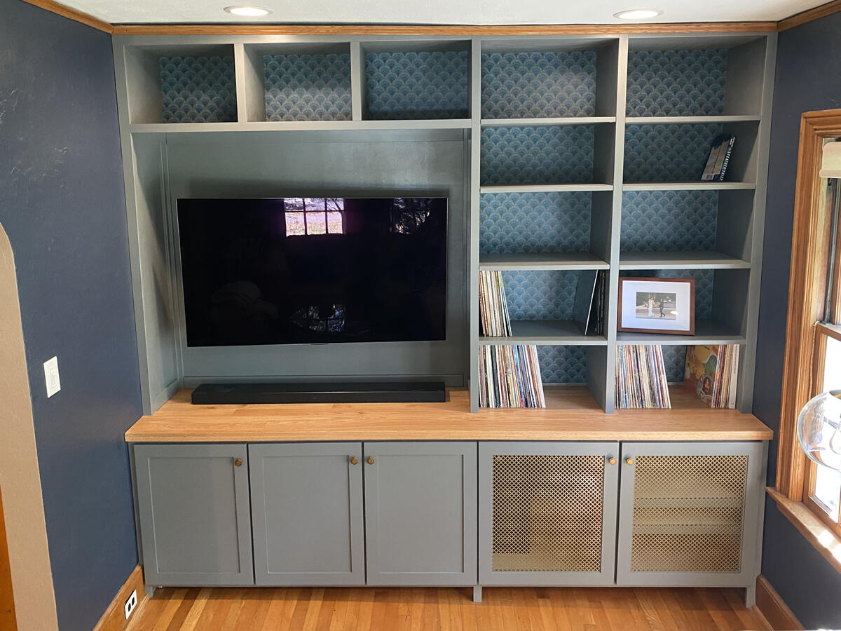 Custom Built-Ins w/ Oak Counter Top, Wallpaper, and Doors w/ Brass Screens