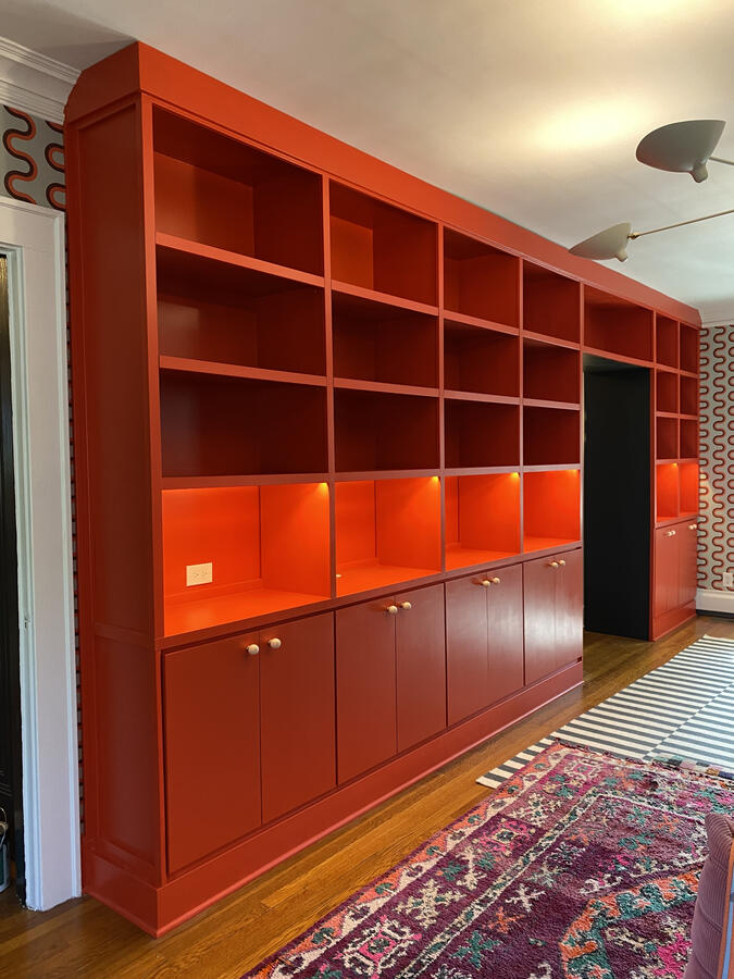 Custom Built-In Cabinets and Bookshelves w/ Lighting. Integrated into room doorway