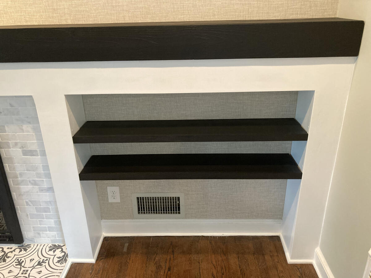 Custom Fireplace Surround added to existing tile, w/ Solid Douglas Fir Mantel, and Floating Shelving