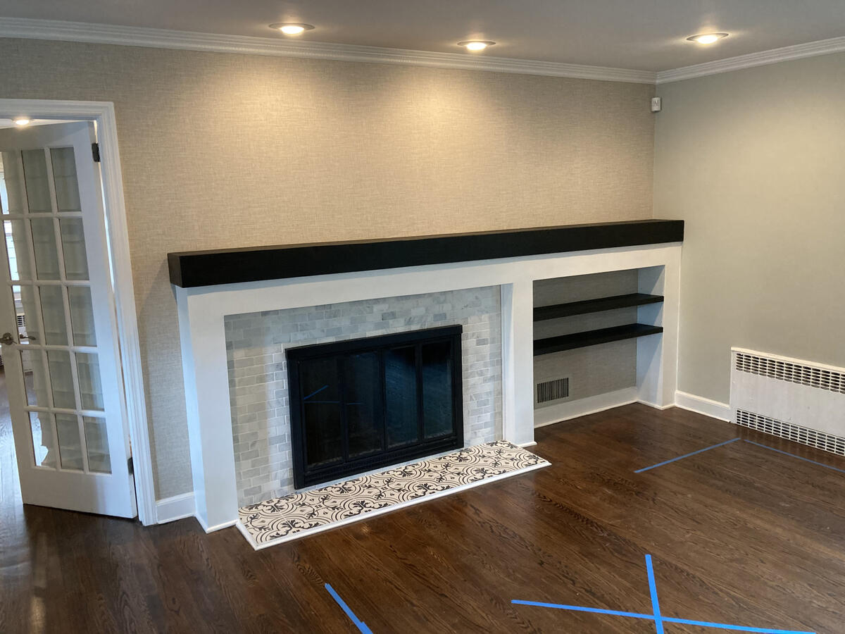 Custom Fireplace Surround added to existing tile, w/ Solid Douglas Fir Mantel, and Floating Shelving