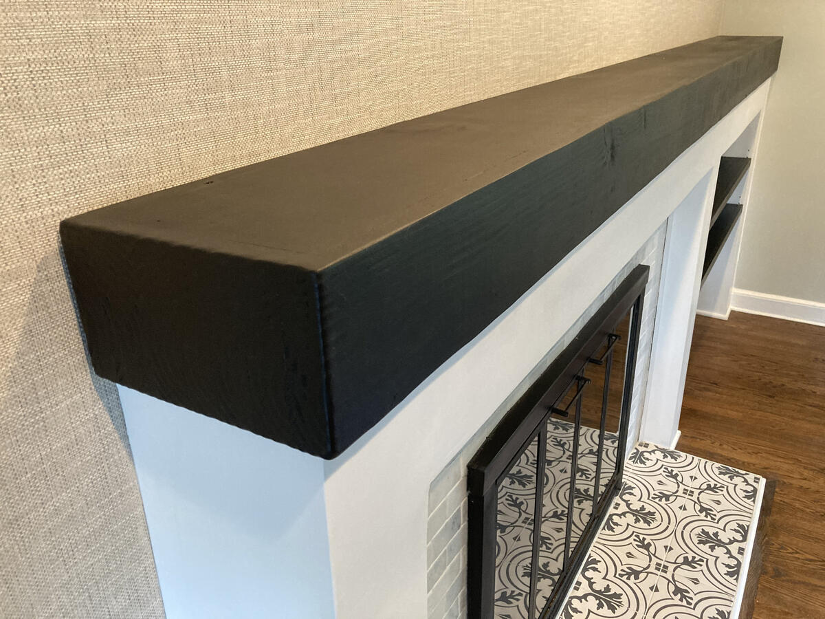 Custom Fireplace Surround added to existing tile, w/ Solid Douglas Fir Mantel, and Floating Shelving